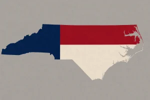 Map outline of North Carolina filled with red, white, and blue horizontal stripes inspired by the state flag, set against a plain gray background.
