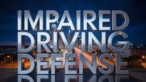 NC impaired driving defense graphic with bold metallic &ldquo;Impaired Driving Defense&rdquo; text over the Charlotte skyline at night, representing North Carolina DWI and DUI legal representation in Mecklenburg, Union, Iredell, Gaston, Lincoln and Rowan Counties North Carolina